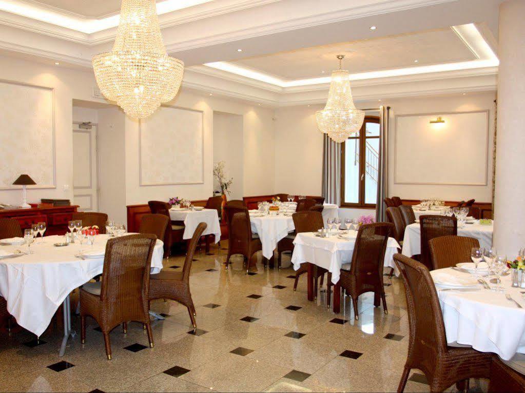 Logis - Hotel Restaurant Du Parc Cransac Exterior foto